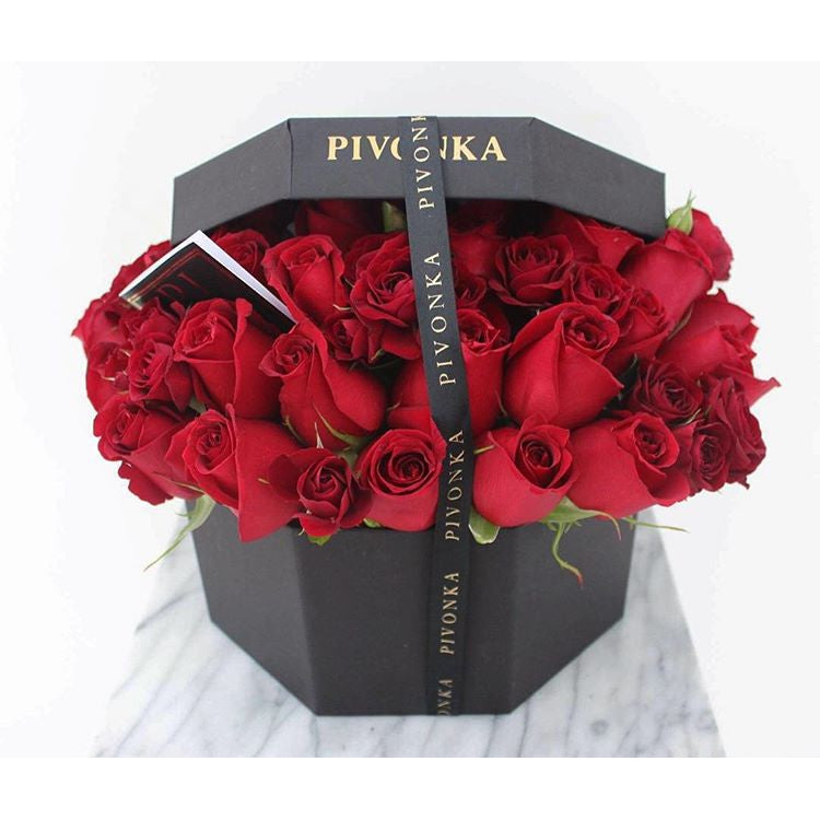 Pivonka Flores Monterrey. Caja octagonal con rosas rojas.