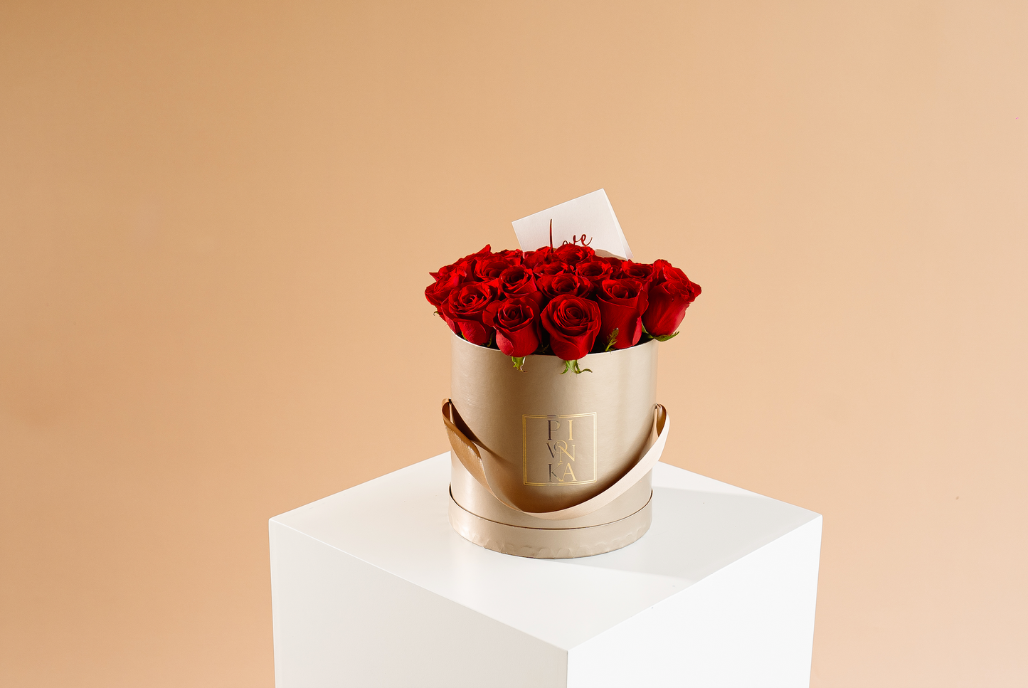 CAJA REDONDA CHAMPAGNE ROSAS ROJAS